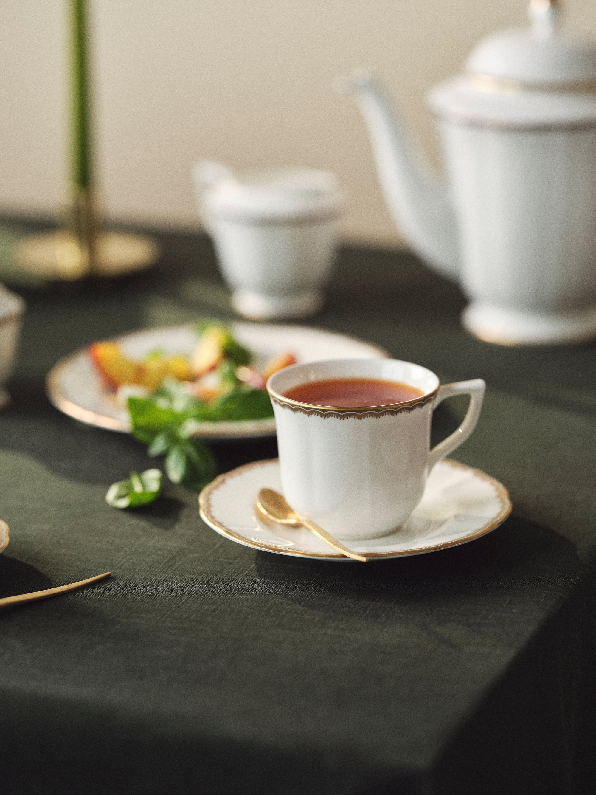 Prouna Antique Gold Tea Cup & Saucer White Background Photo