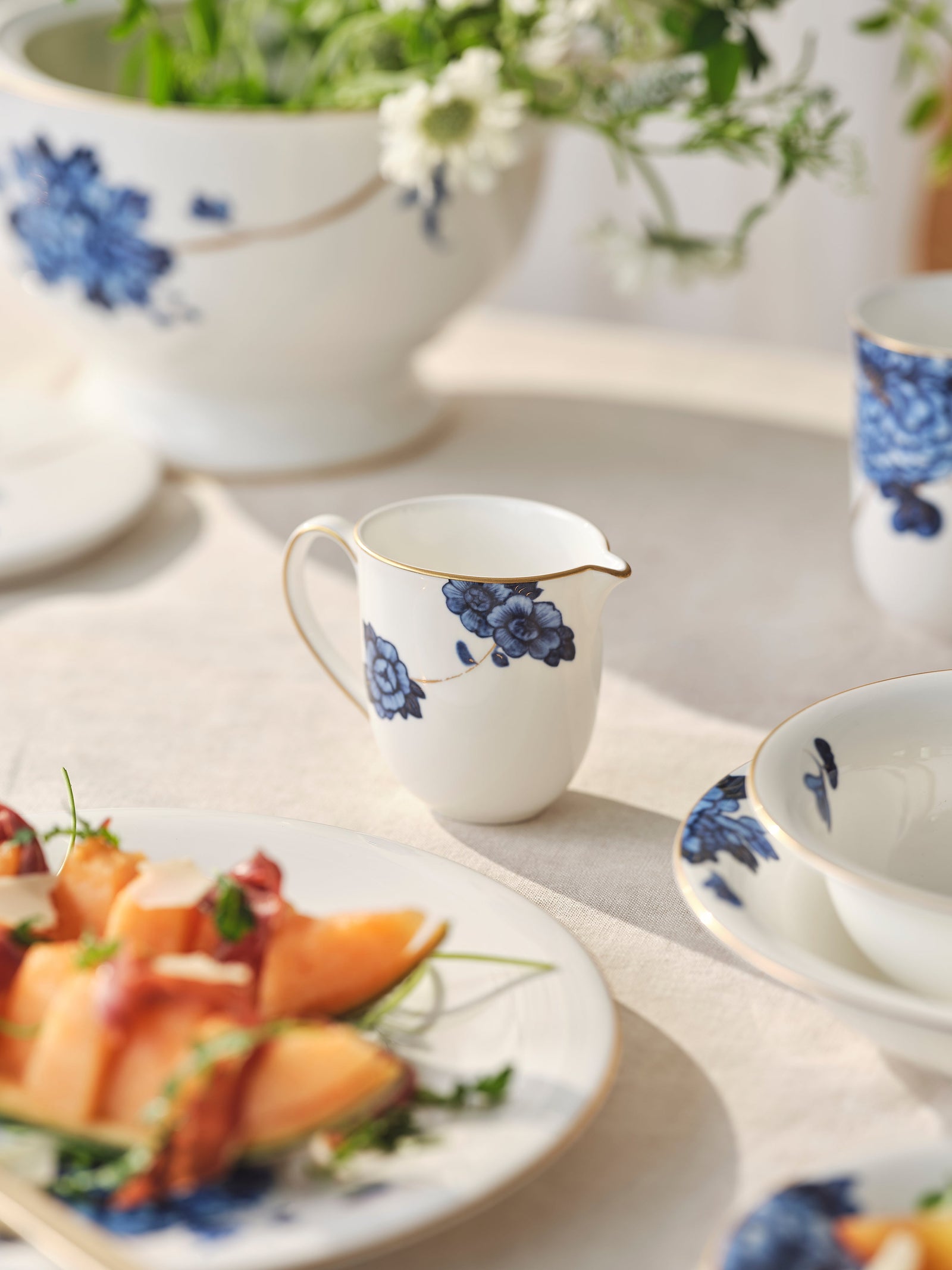 Prouna Emperor Flower Creamer White Background Photo