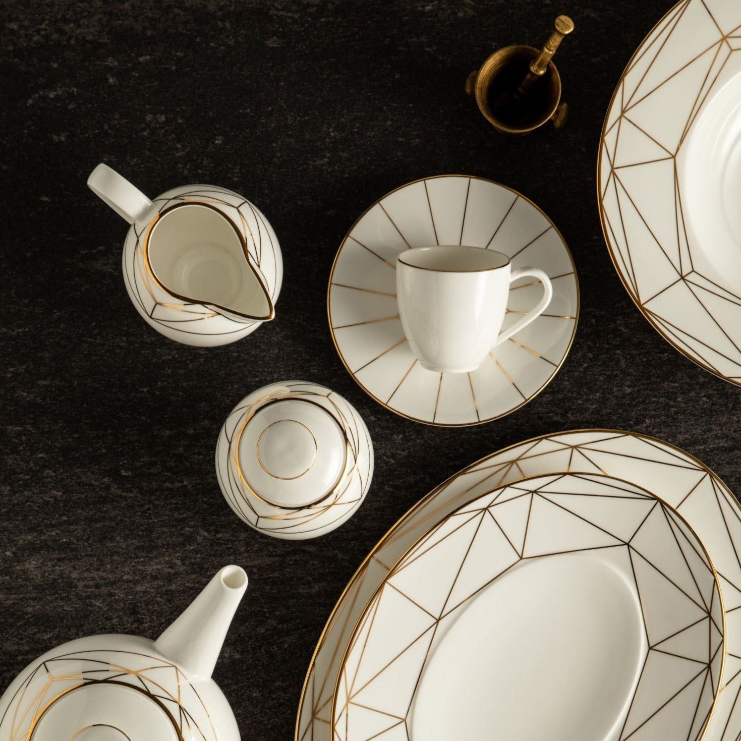 Prouna Gem Cut Gold Gravy Boat & Saucer White Background Photo