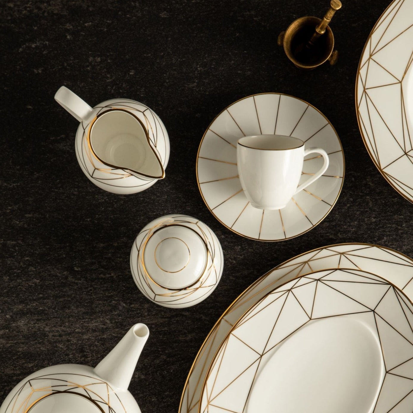 Prouna Gem Cut Gold Creamer White Background Photo