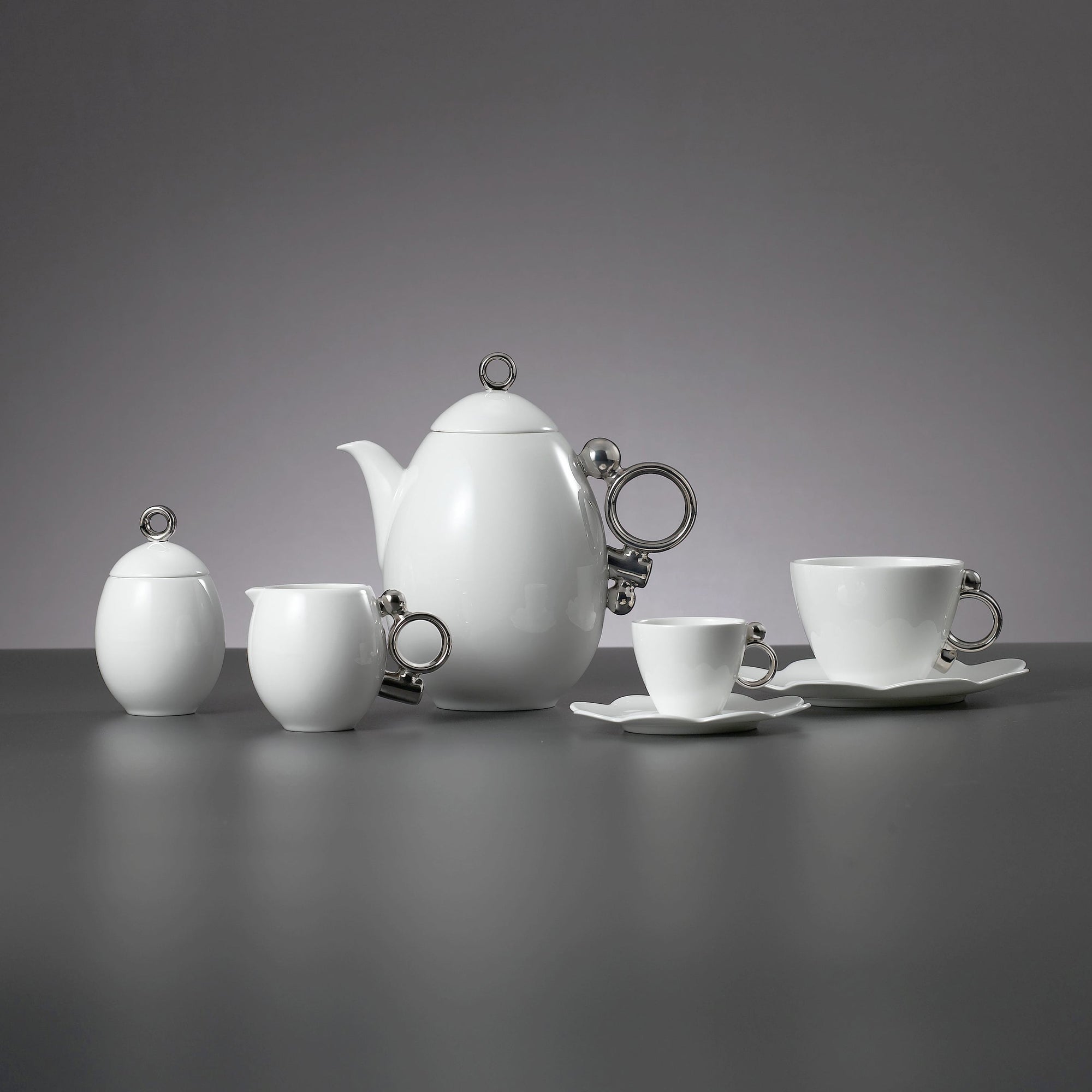 Prouna Geometrica Teapot with Silver Rim White Background Photo