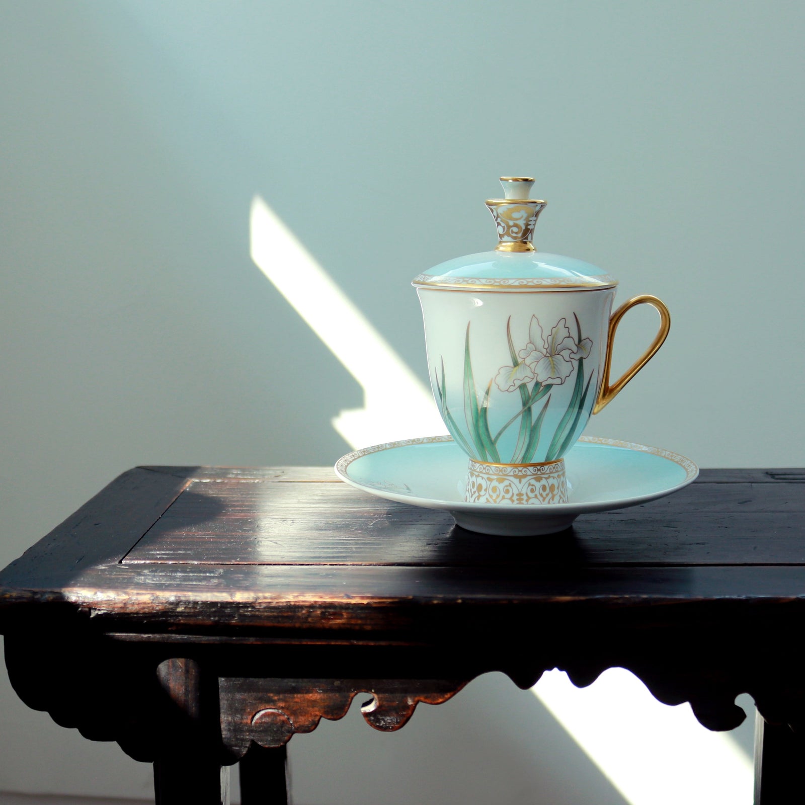 Prouna Iris Tea Cup with Cover & Saucer White Background Photo