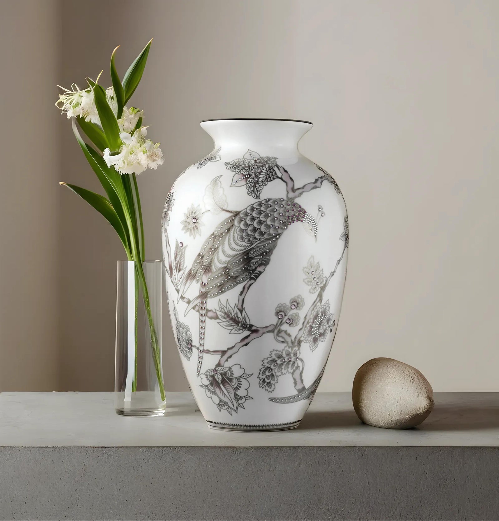 Pavo silver vase with black floral patterns and Swarovski on a neutral background